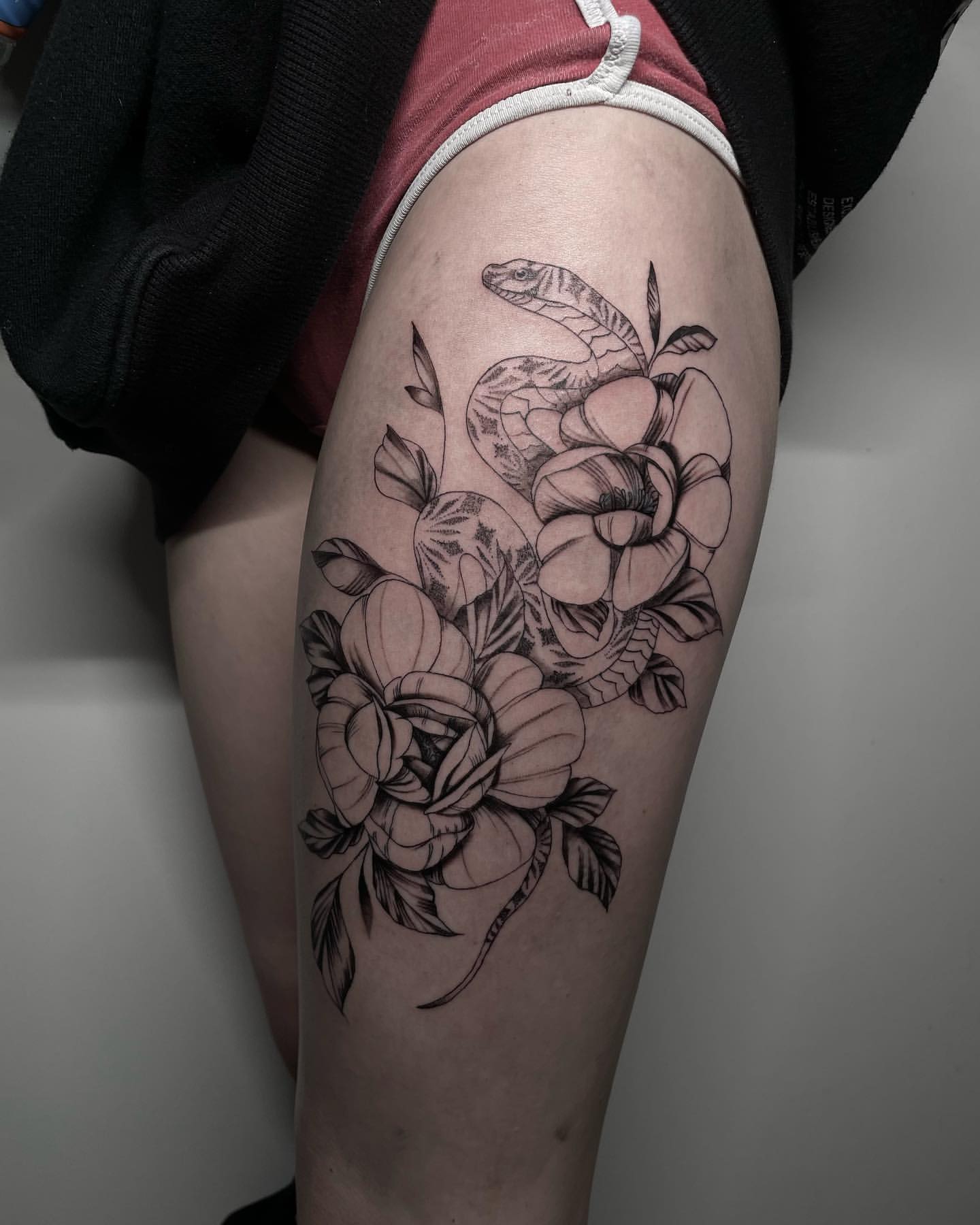 thigh tattoo