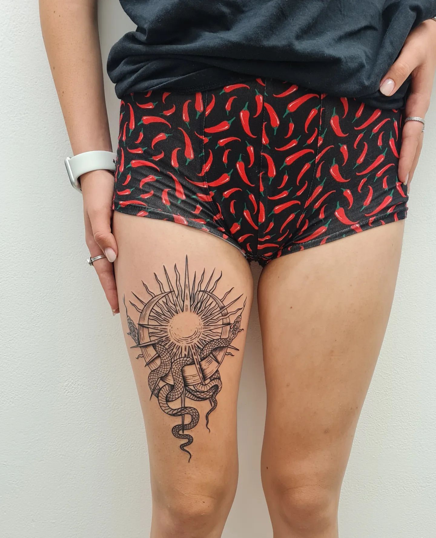 thigh tattoo